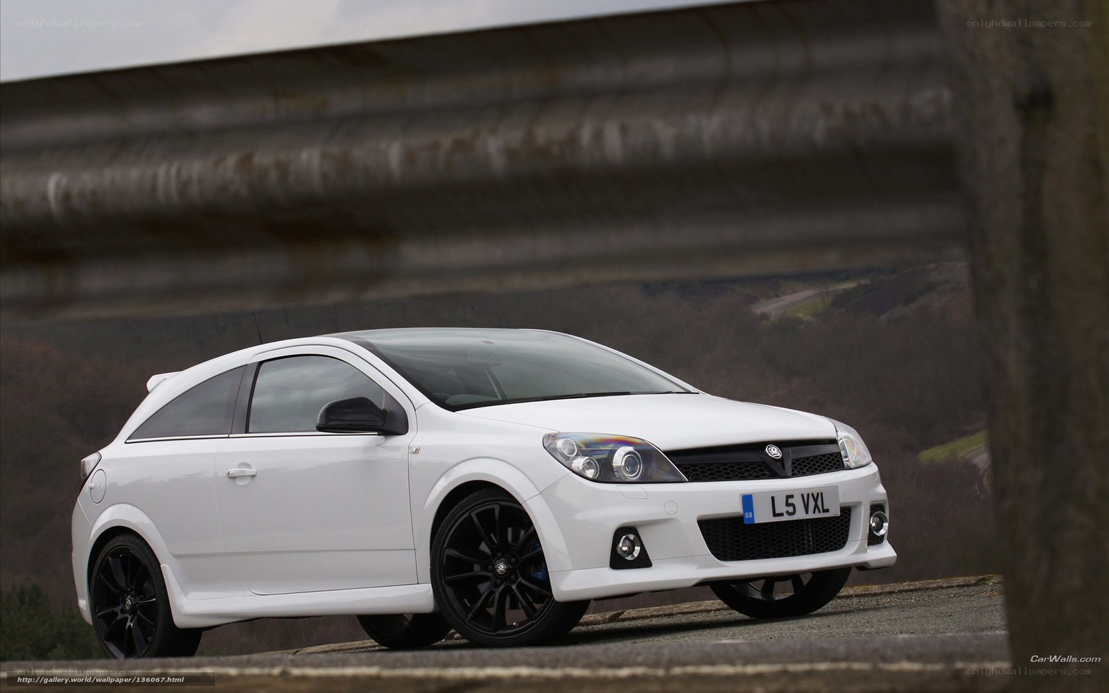 white Vauxhall Astra hatchback