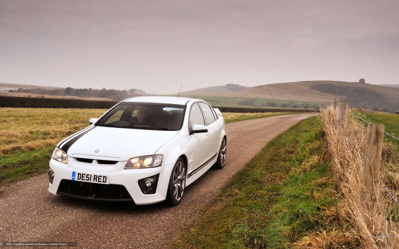 White Vauxhall on country road