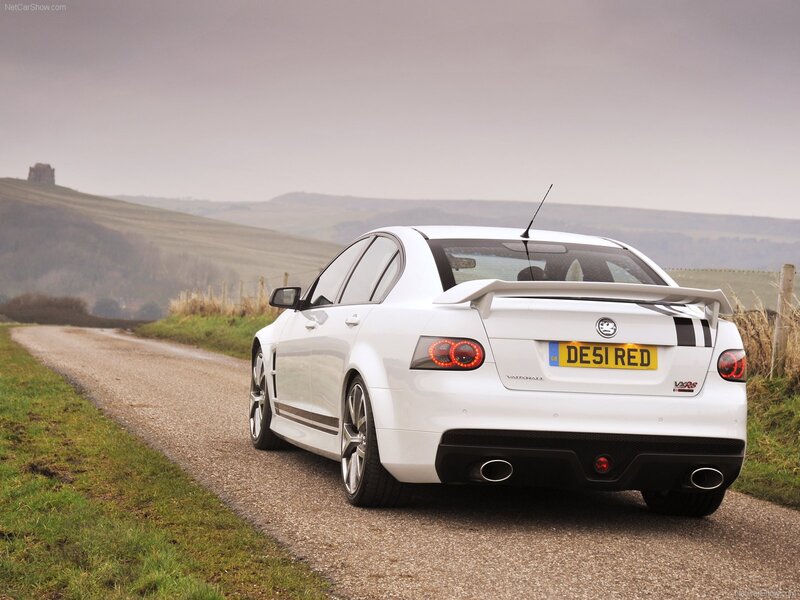white Vauxhall VXR8 on country road