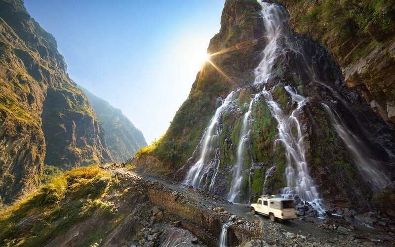 White Vehicle on Mountain Road