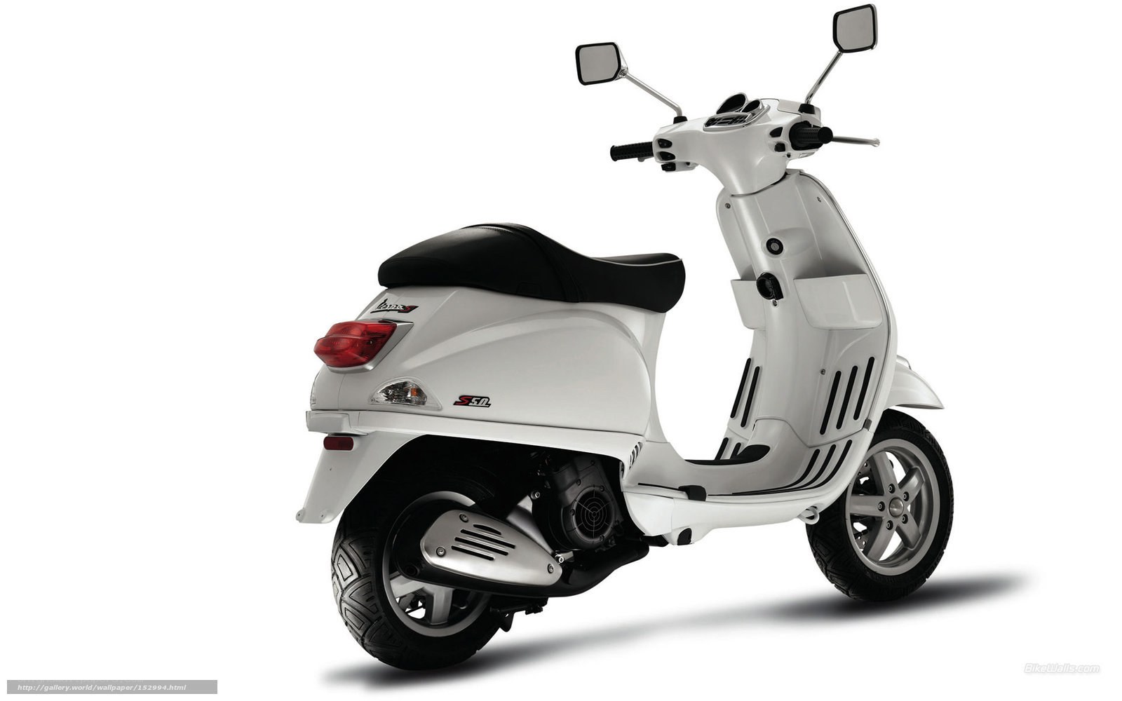 white vespa scooter