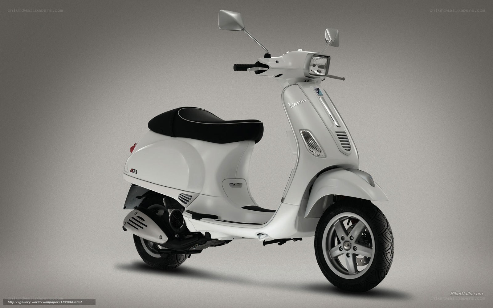 white vespa scooter