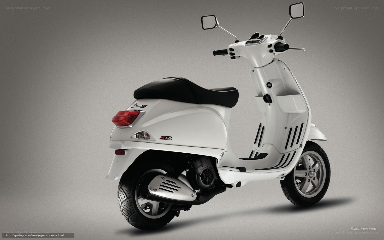 white vespa scooter