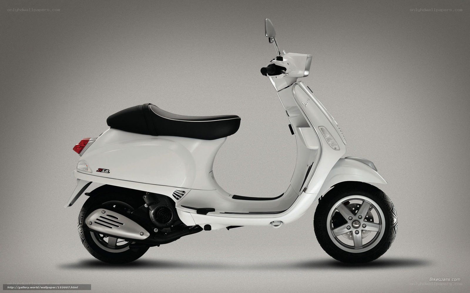 white vespa scooter