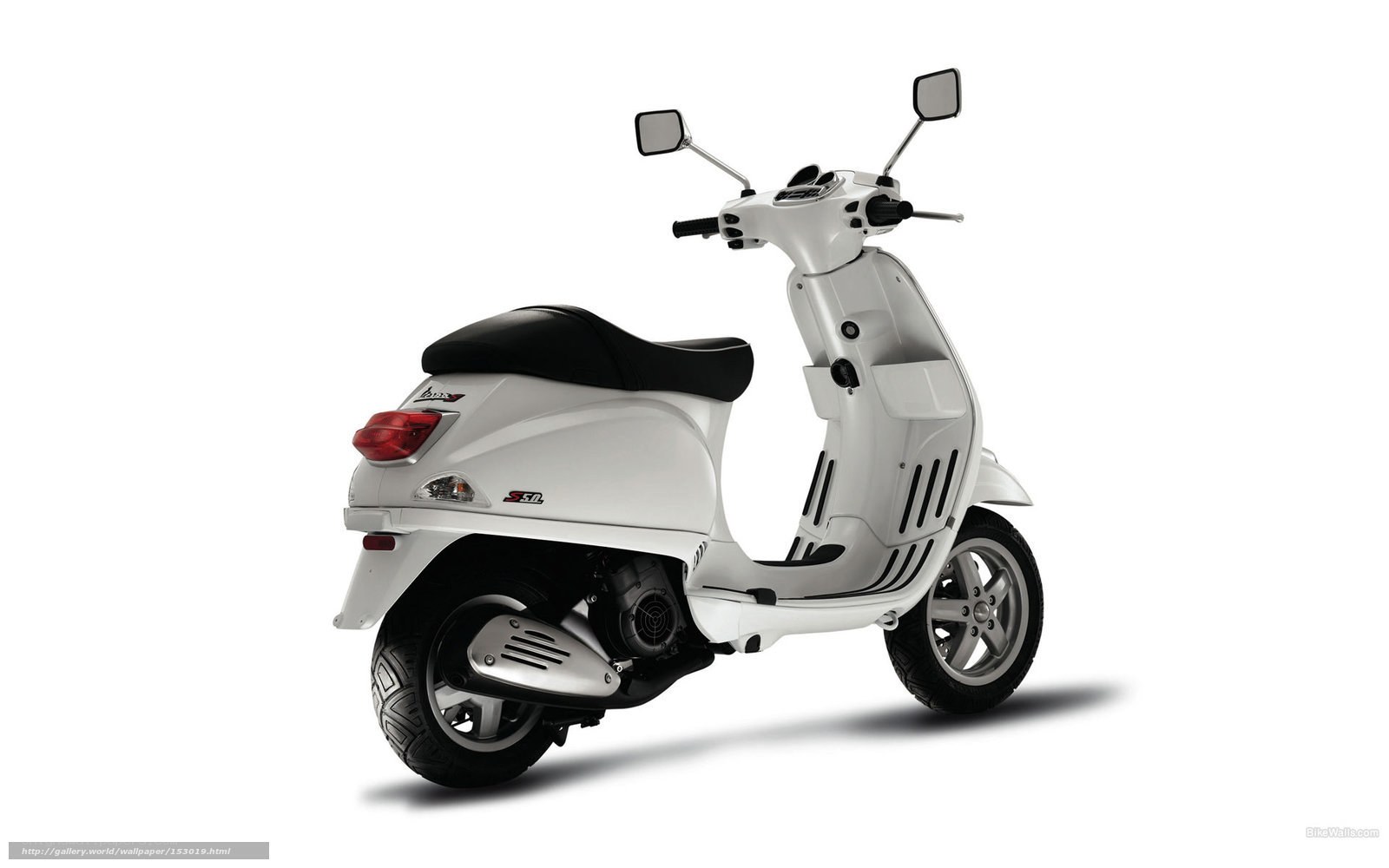 white vespa scooter