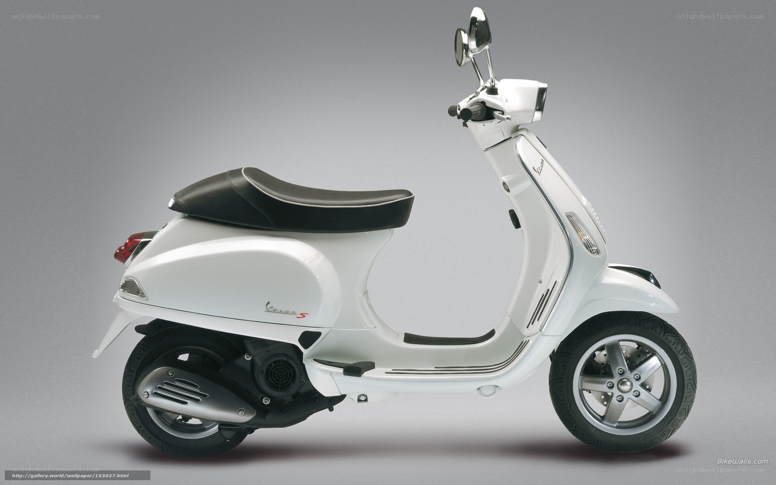 white vespa scooter