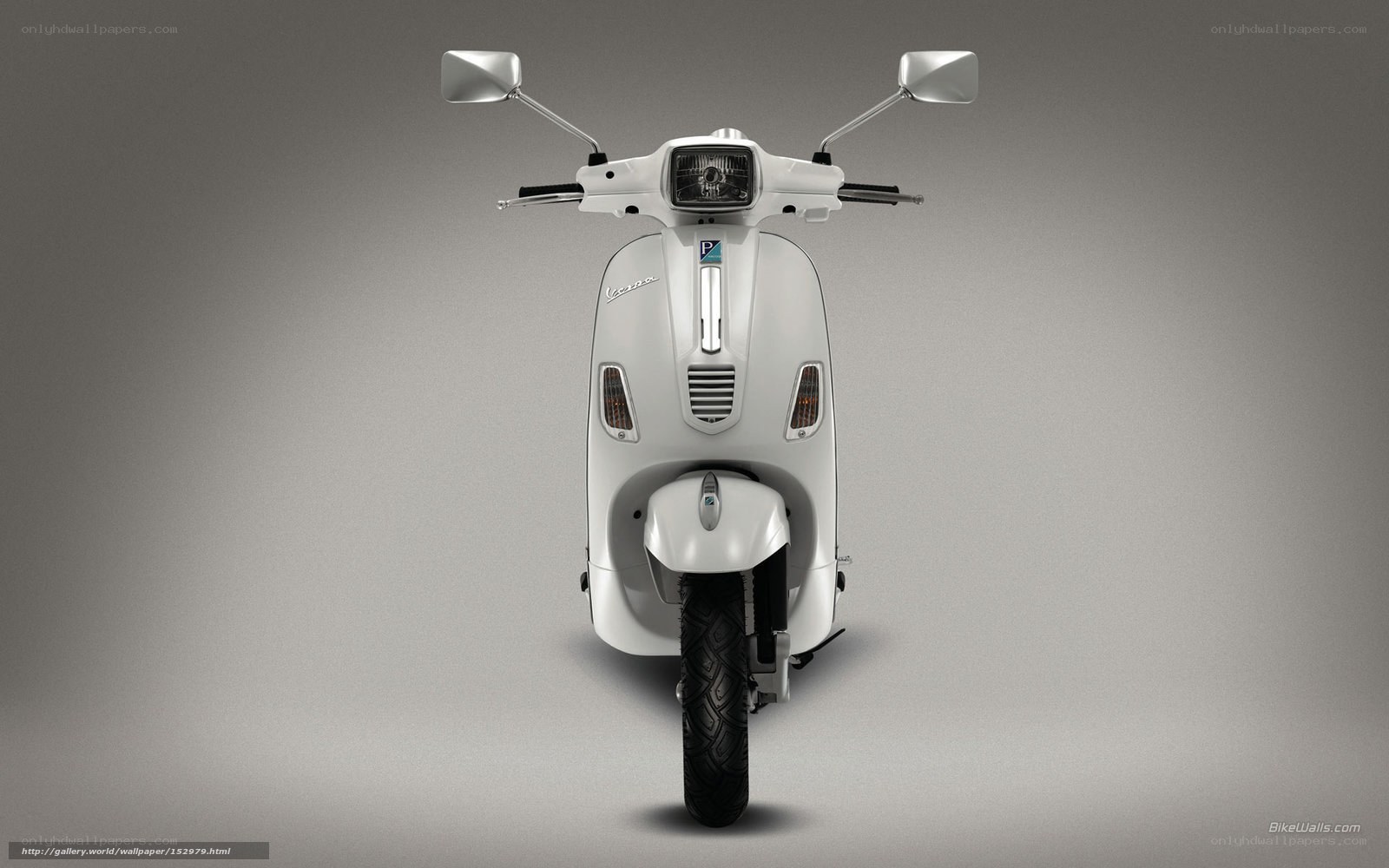 white vespa scooter front view