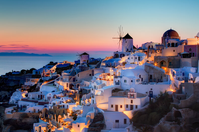 White Village on Cliff — Serene, Sunset