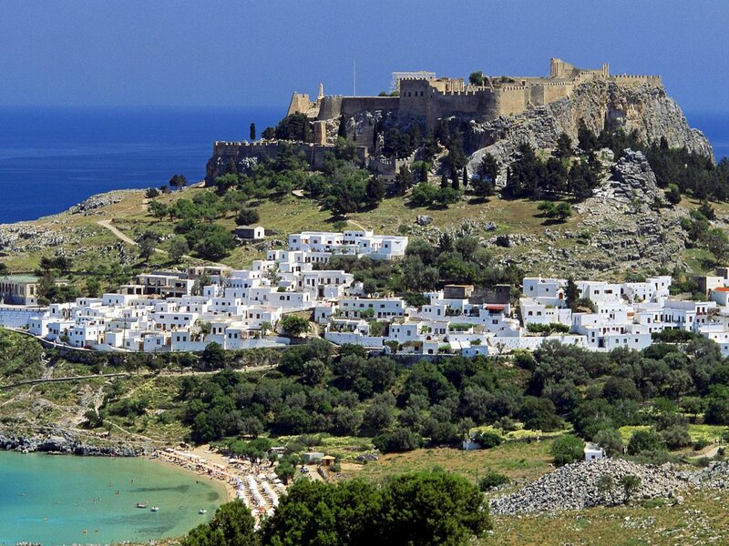 White Village on Hillside — Blue