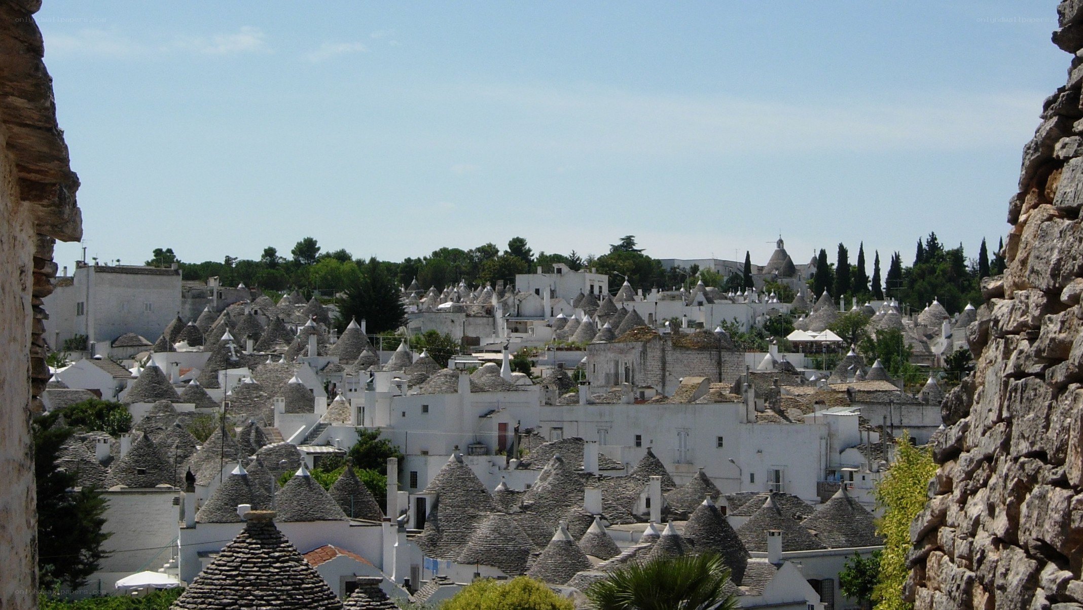 White village with conical roofs