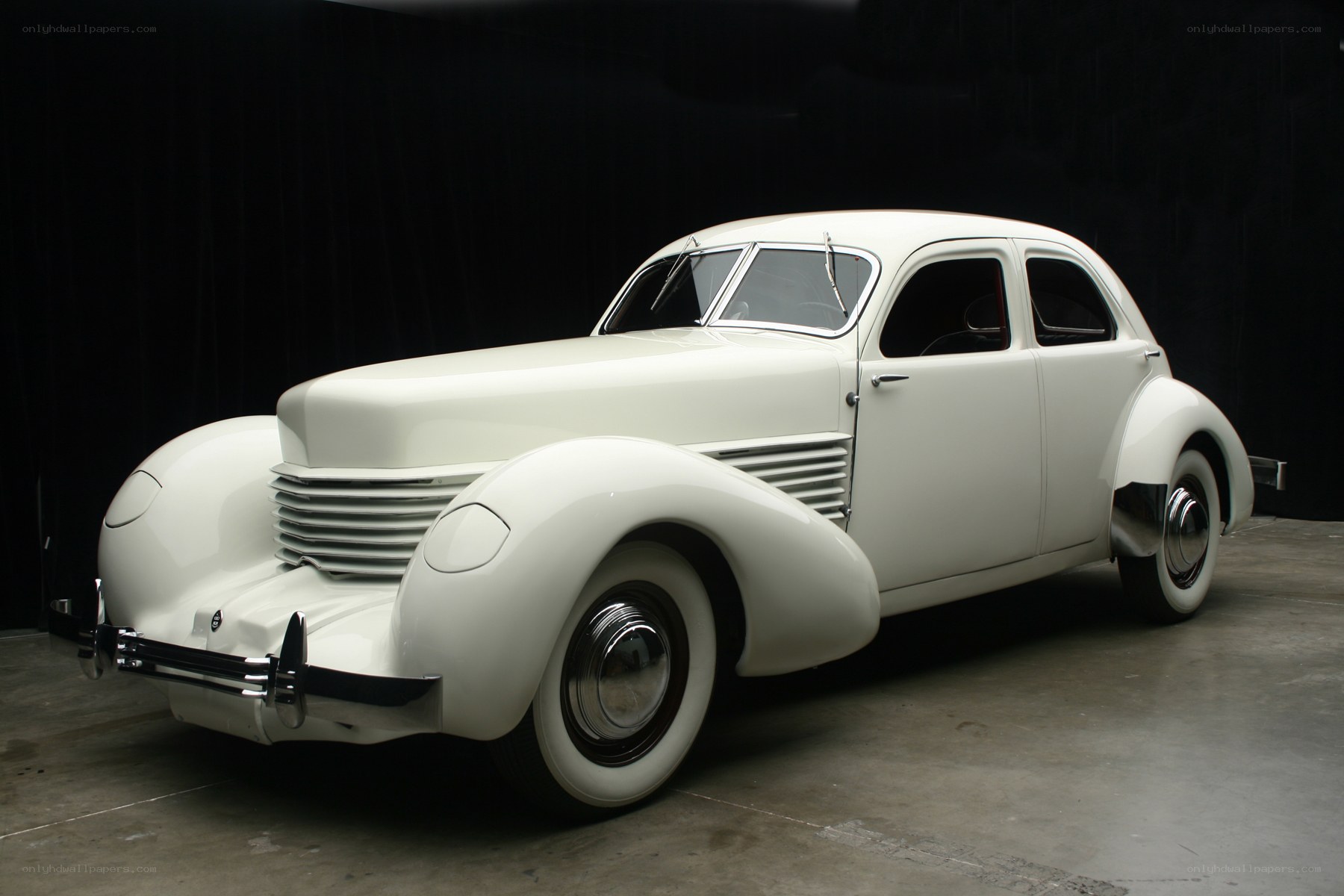 White vintage car display