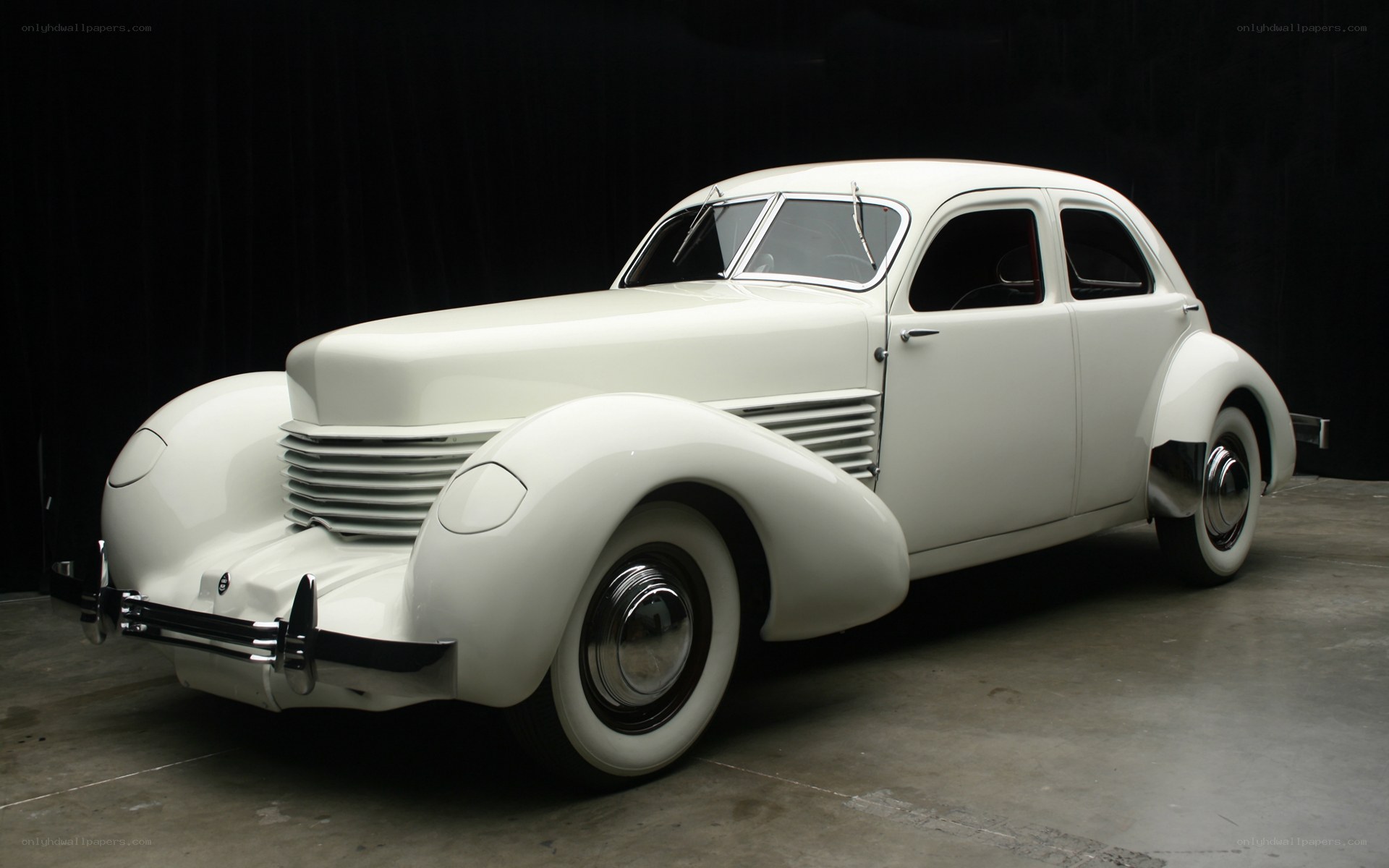 White vintage car display