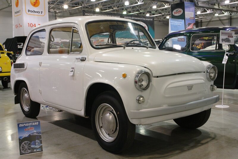 White vintage car on display