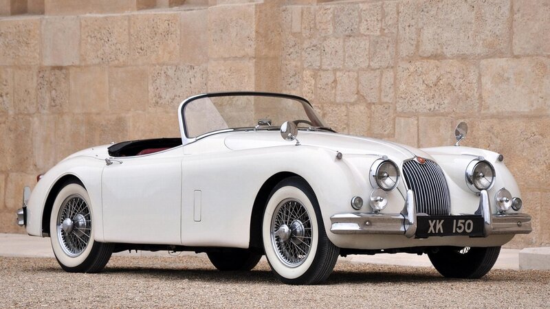 White Vintage Convertible — Calm, Afternoon, Photograph, Stone Wall, Wire Wheels