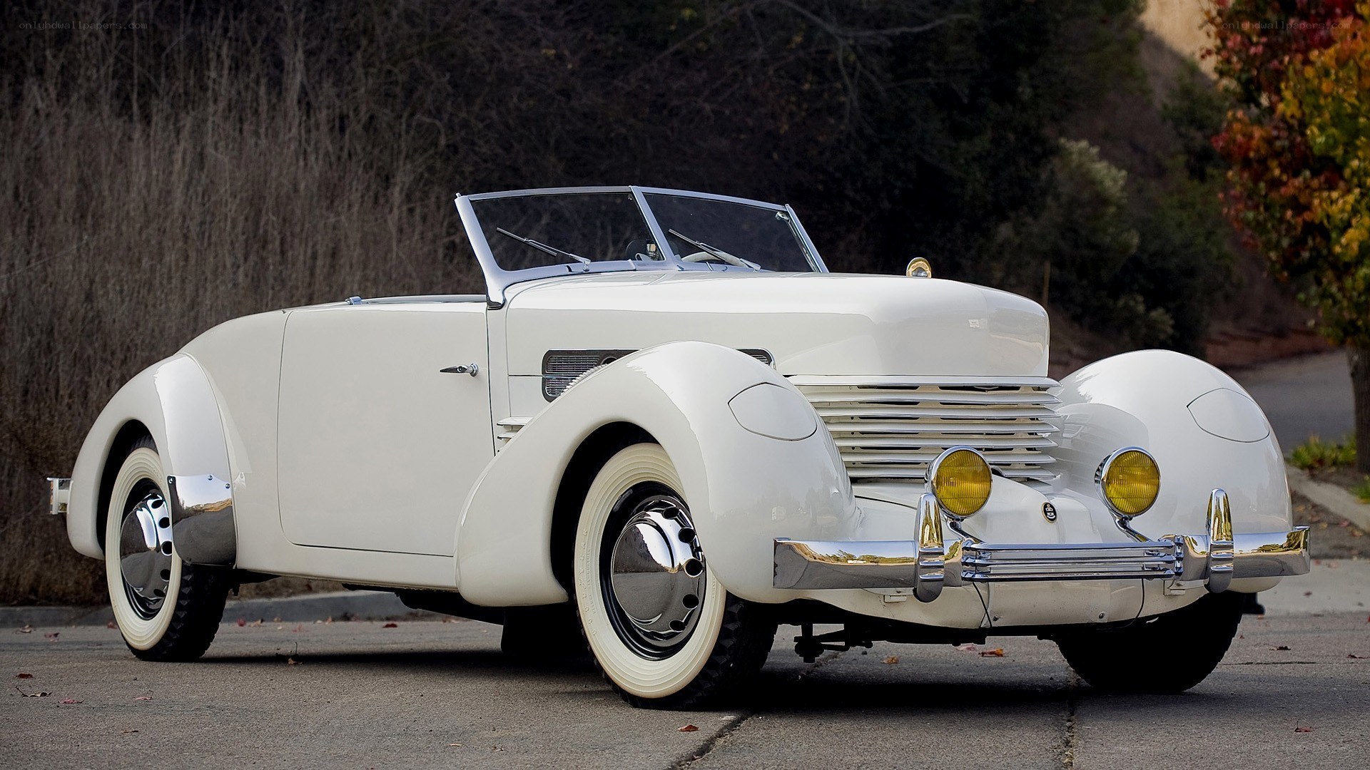 White vintage convertible car