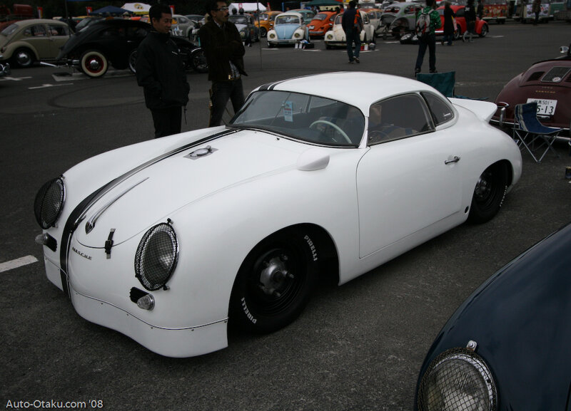 White vintage race car at show