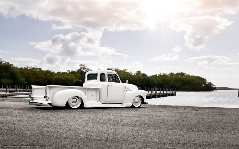 white vintage truck by water