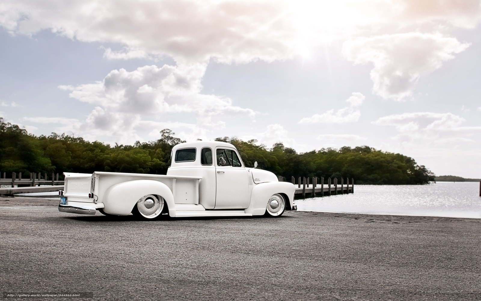 white vintage truck by water