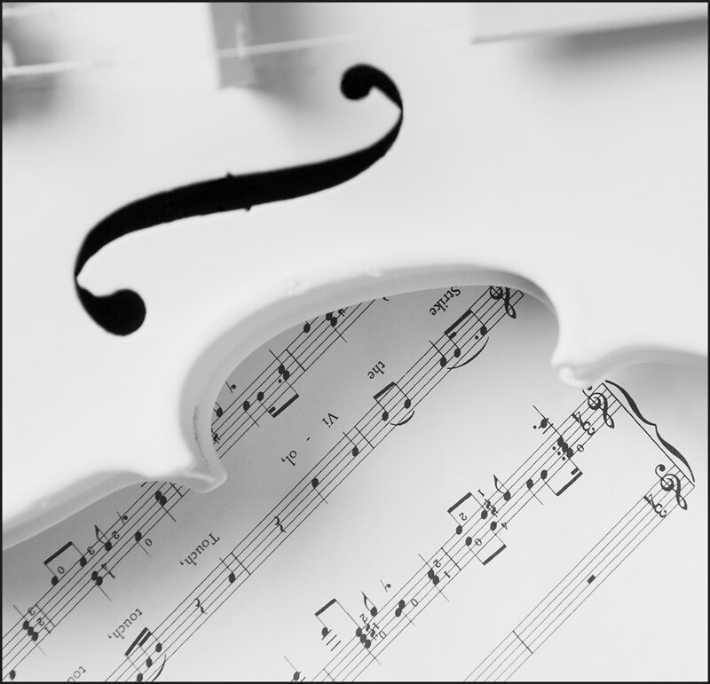 White Violin on Sheet Music