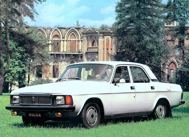 White Volga car in a park
