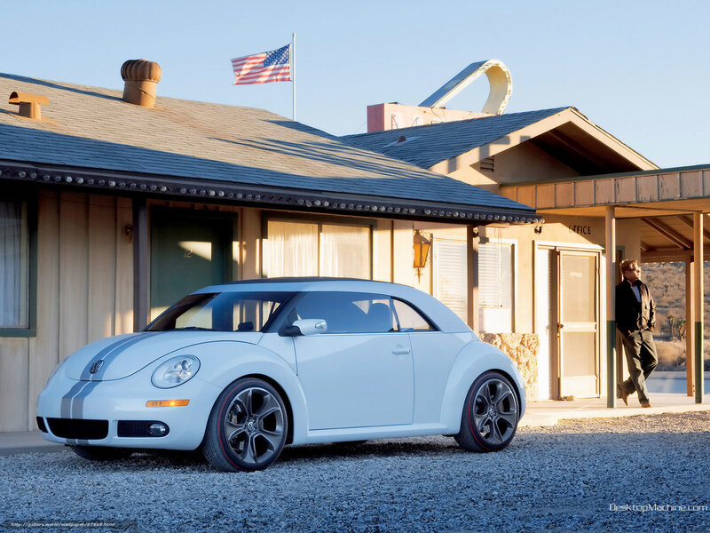 White Volkswagen Beetle at a desert motel