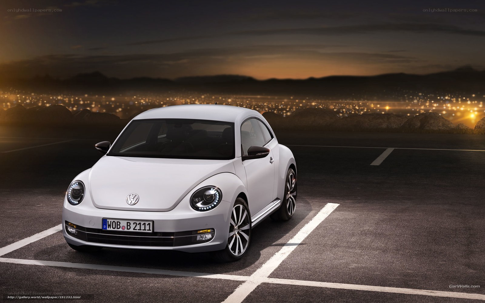 White Volkswagen Beetle at dusk