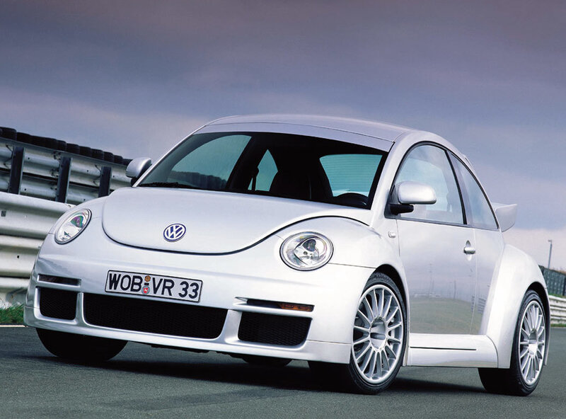 White Volkswagen Beetle on a racetrack