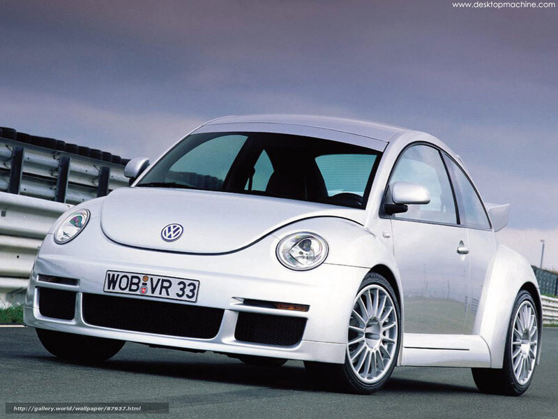 White Volkswagen Beetle on a racetrack