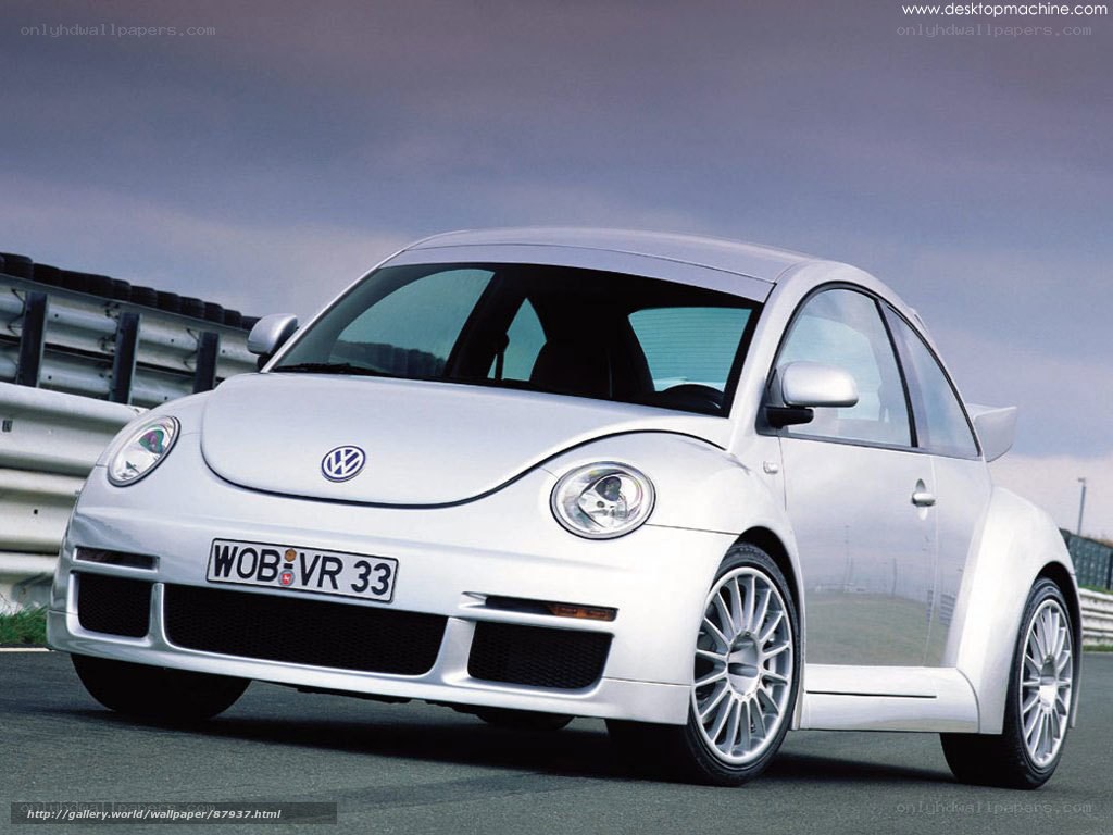 White Volkswagen Beetle on a racetrack