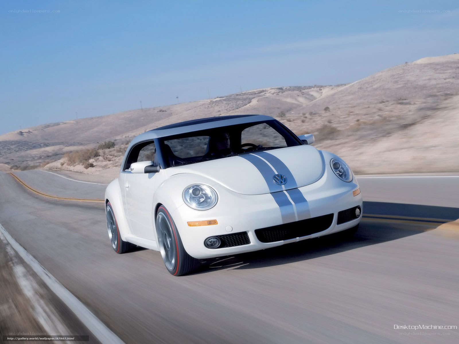 White Volkswagen Beetle on desert road
