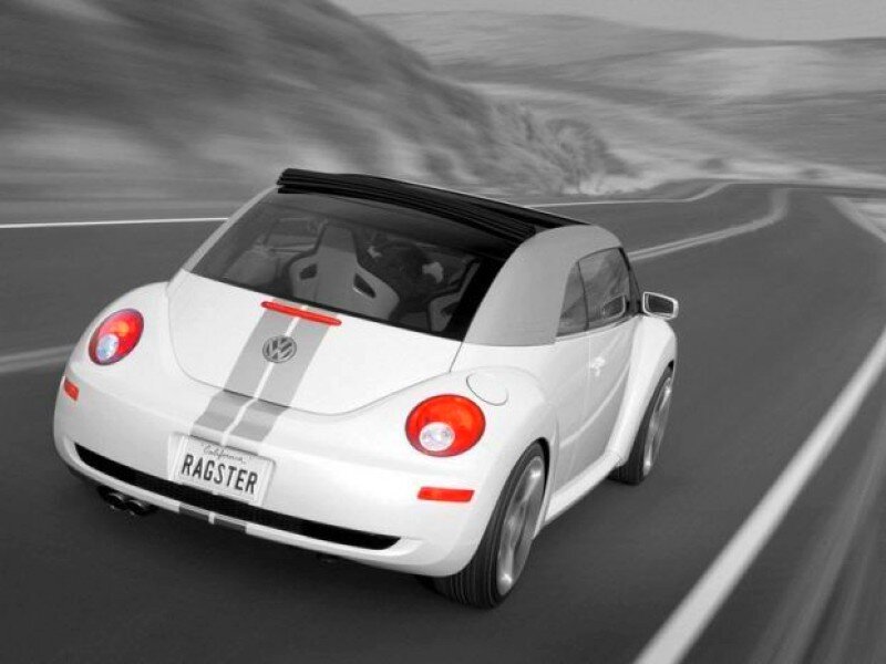 White Volkswagen Beetle on road