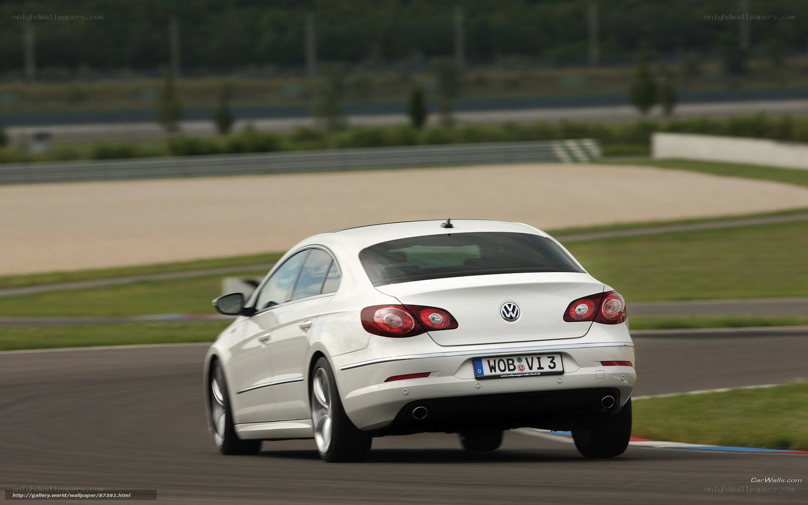 white volkswagen cc on racetrack