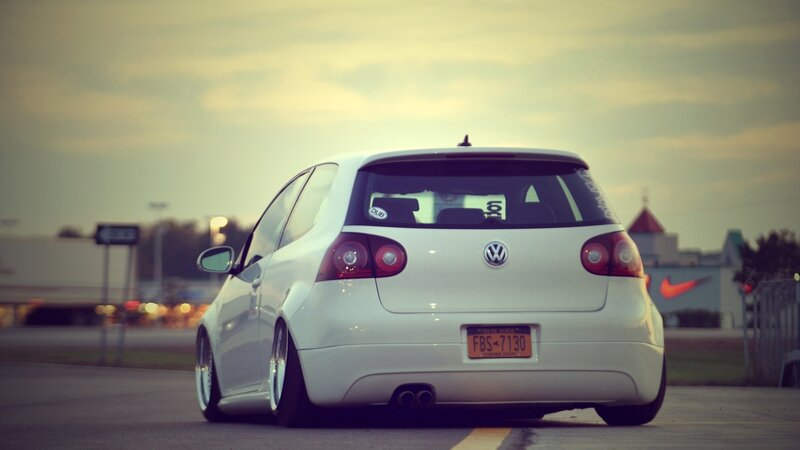 white volkswagen golf at dusk