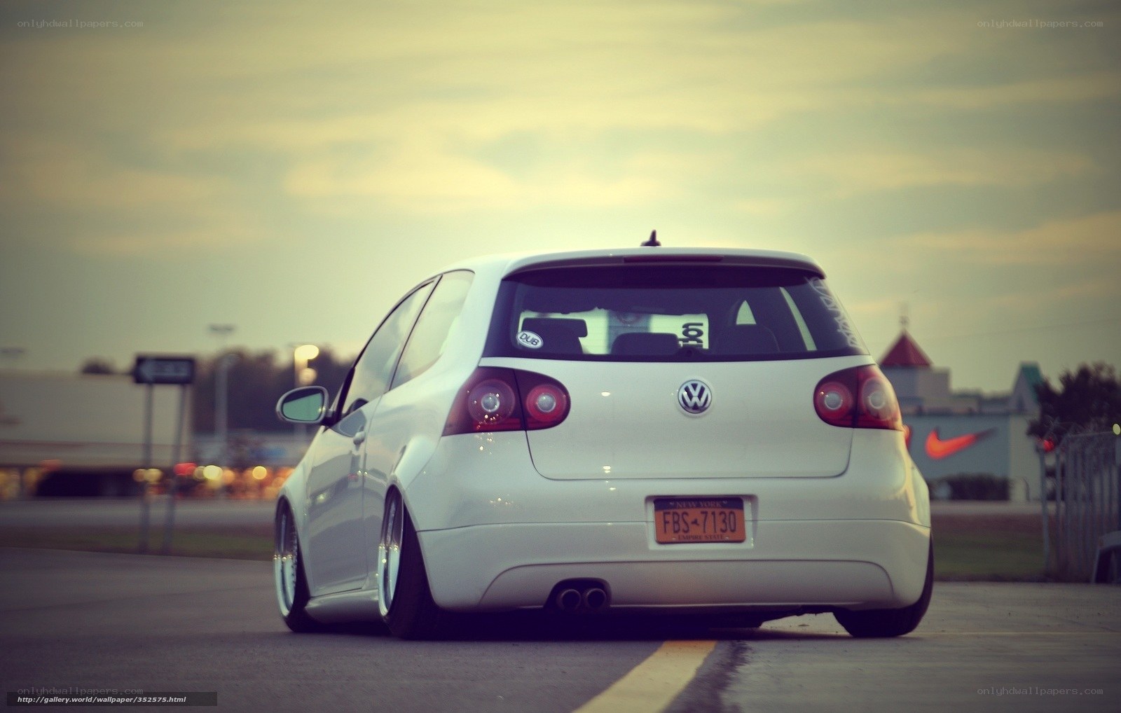white volkswagen golf at dusk