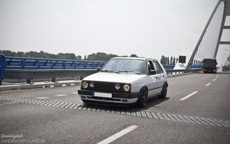 White Volkswagen Golf — Calm, Afternoon, Photograph, Bridge
