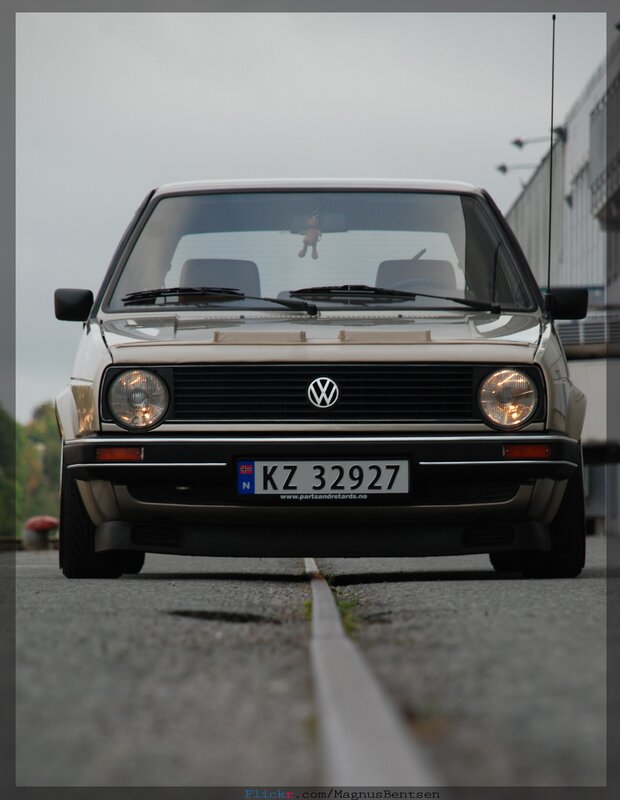 White Volkswagen Golf — Gray