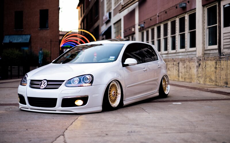 white volkswagen golf gti