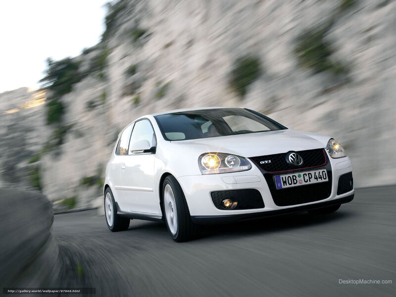 white volkswagen golf gti in motion