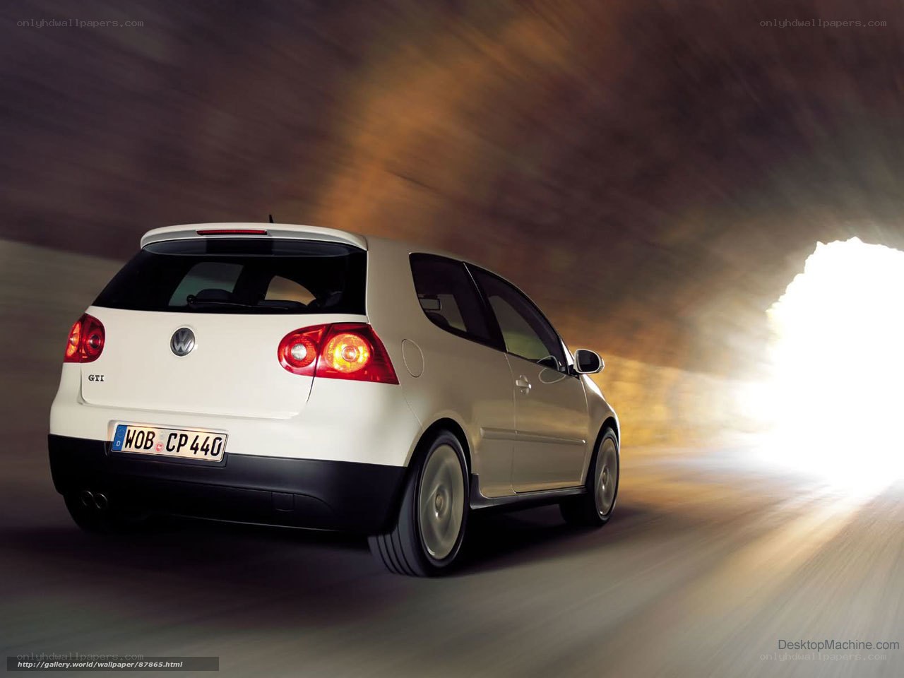 white volkswagen golf gti in tunnel