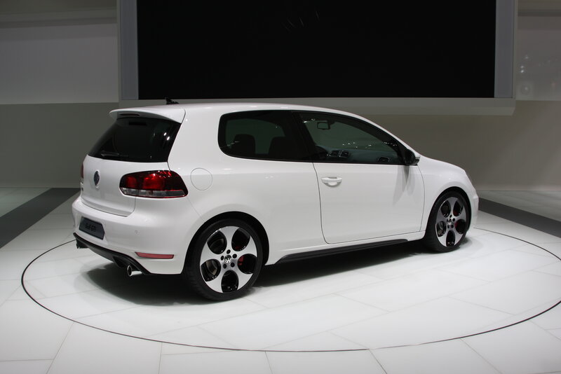 White Volkswagen Golf GTI on display