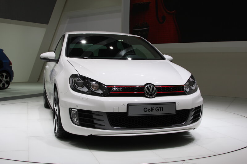 White Volkswagen Golf GTI on display