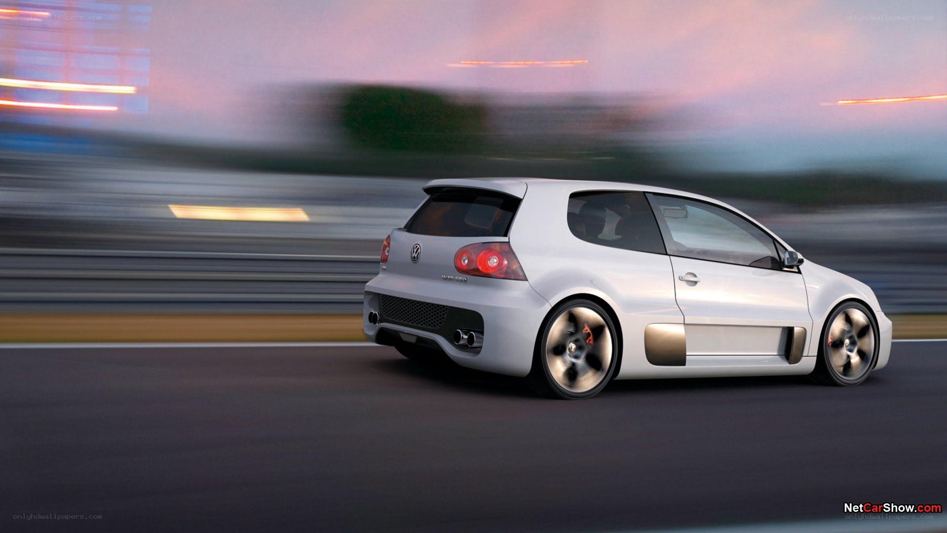 white volkswagen golf in motion