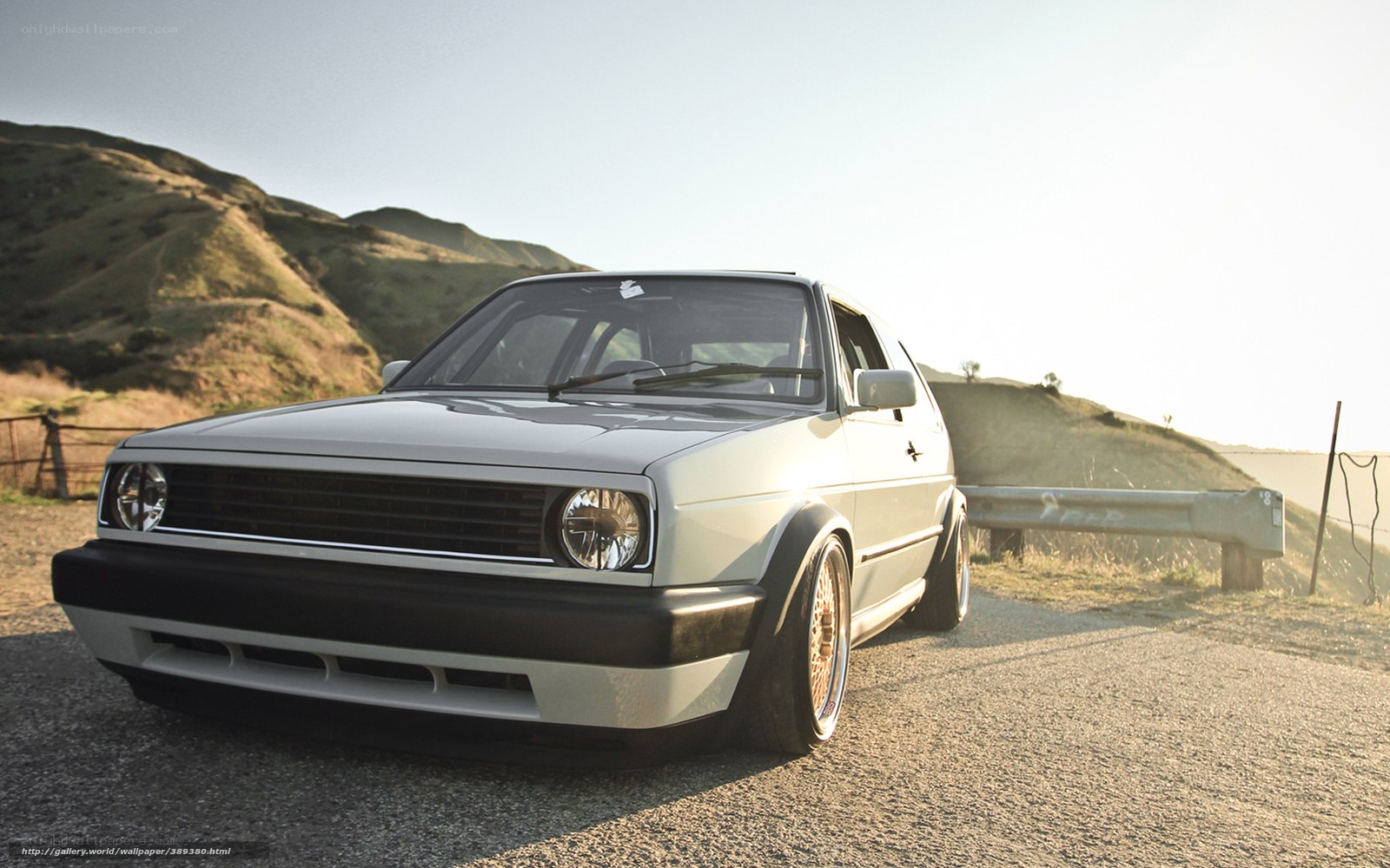 white volkswagen golf on hillside