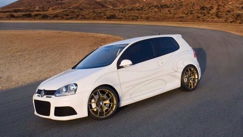 white volkswagen golf on track