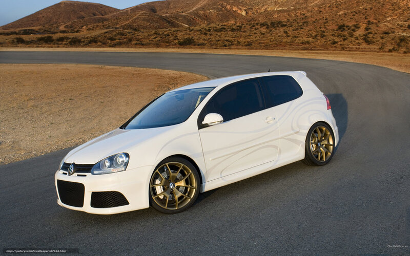 white volkswagen golf on track