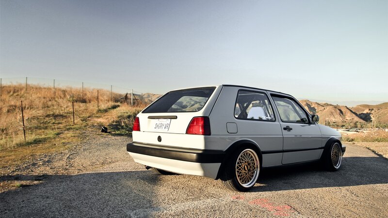 White Volkswagen Golf — Serene, Afternoon, Photograph
