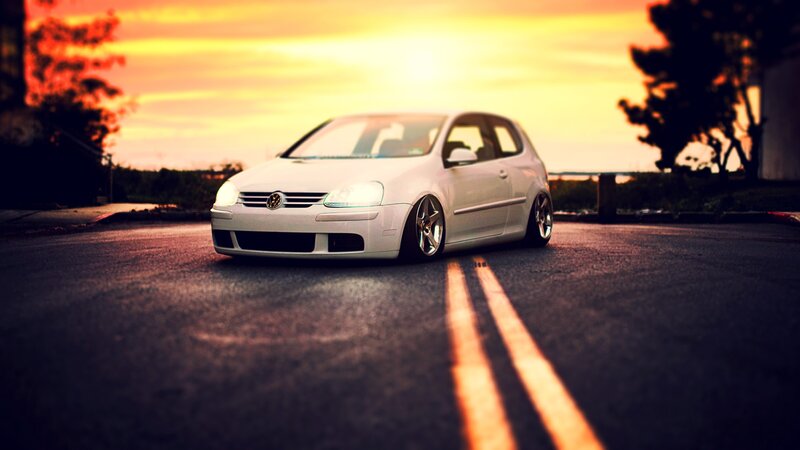 White Volkswagen Golf — Yellow