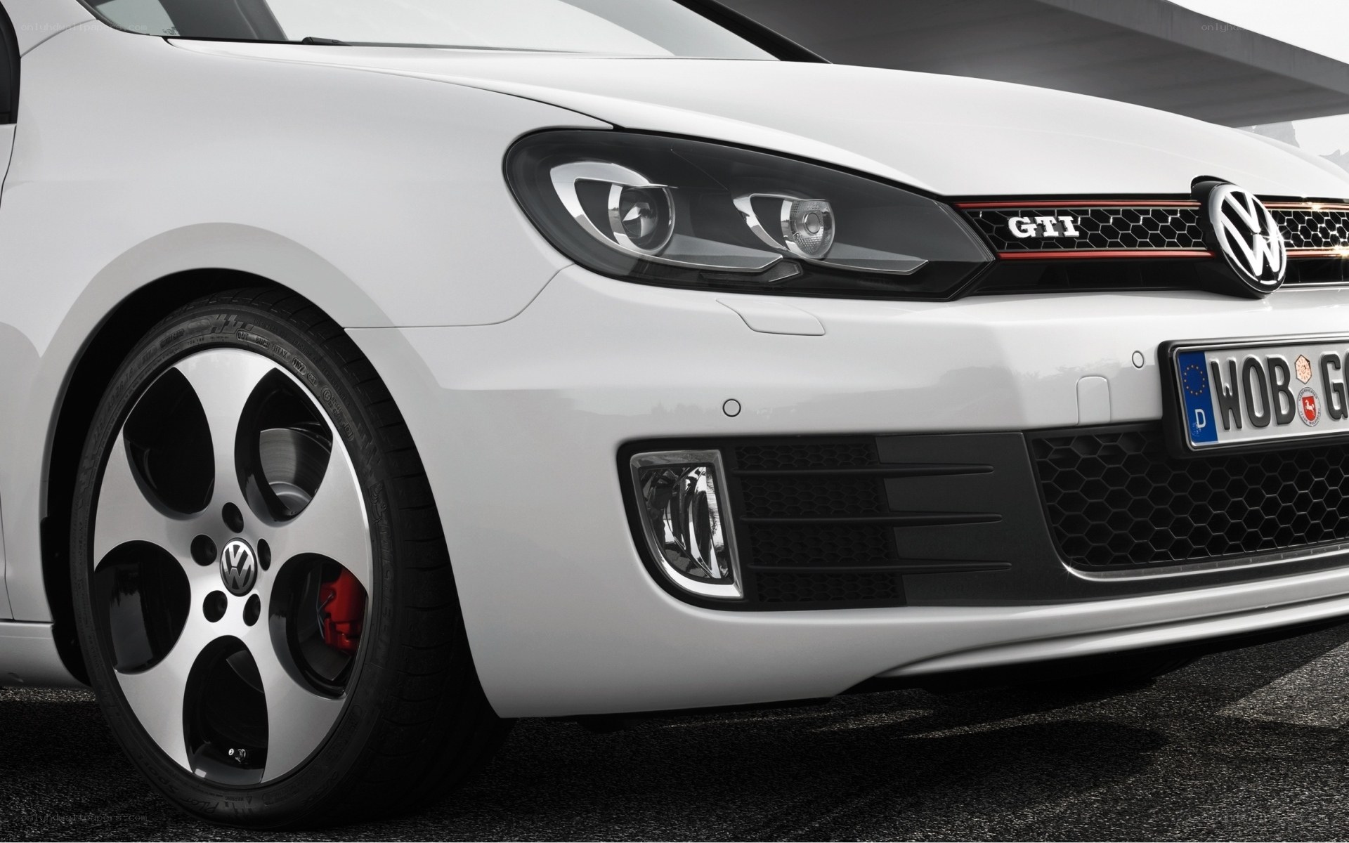 White Volkswagen GTI front view