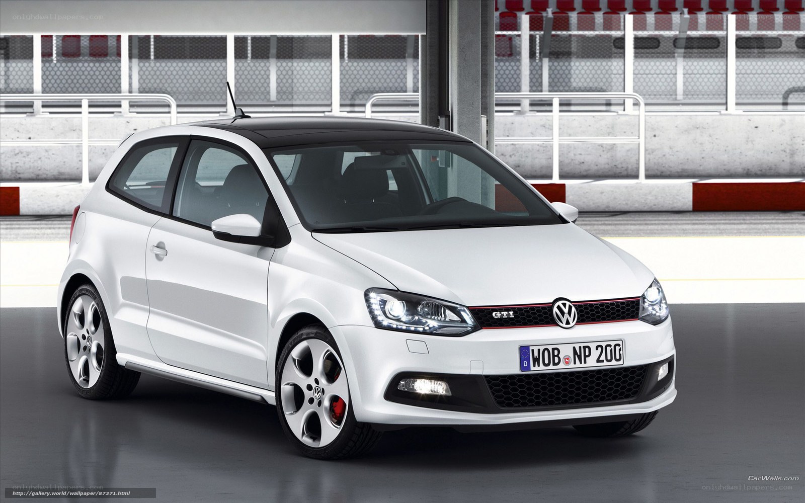 White Volkswagen GTI hatchback