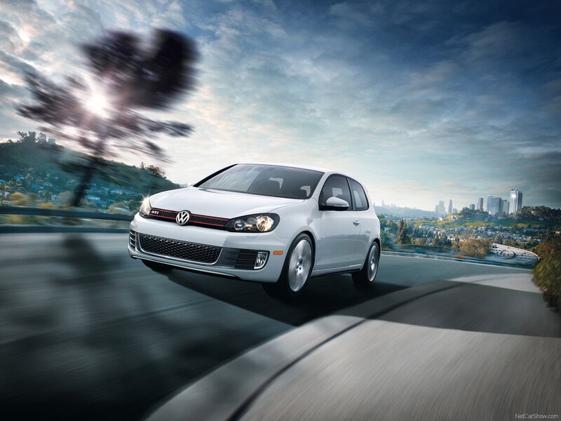 White Volkswagen GTI in motion
